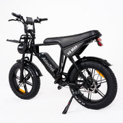 A black Athastel V8 MAX electric bicycle with fat tires, a black saddle, and a digital display on the handlebars, photographed on a clean white background.