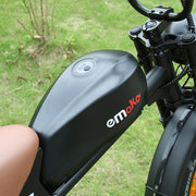Close-up of a black electric bike with 'emoko' branding on a grassy background