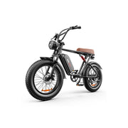 A black electric fat-tire bicycle with a brown saddle, black handlebars, and a round headlight, shown on a clean white background.