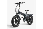 A dark gray folding electric fat tire bike with a rear cargo rack, shown from a three-quarter angle against a light gray background. The brand name 'ENOKU' is visible on the frame.