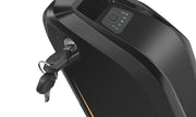 Black scooter with key attached on a white background