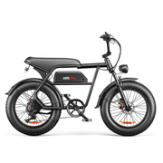 A black electric fat-tire bicycle with a step-through frame, rear storage rack, and front headlight, shown in a clean studio side profile on a white background. The brand name 'emako' is visible on the battery housing.