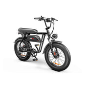 A black electric fat-tire bicycle with a step-through frame, rear storage seat, and front headlight, photographed on a clean white studio background. The frame has a visible 'simo' logo.
