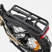 Close-up of a bicycle's rear wheel and rack on a white background